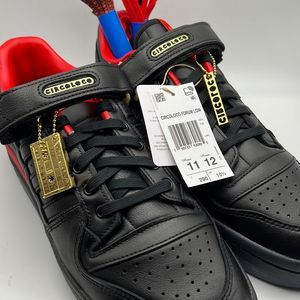 adidas Black and Red Low-Top Sneakers with Gold Accents